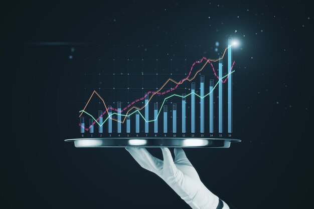 Close up of hand in glove holding tray with creative glowing business graph on black background Toned image Finance annual report and money concept