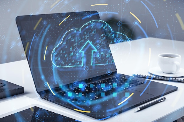 Close up of laptop with cloud computing hologram Database concept Double exposure