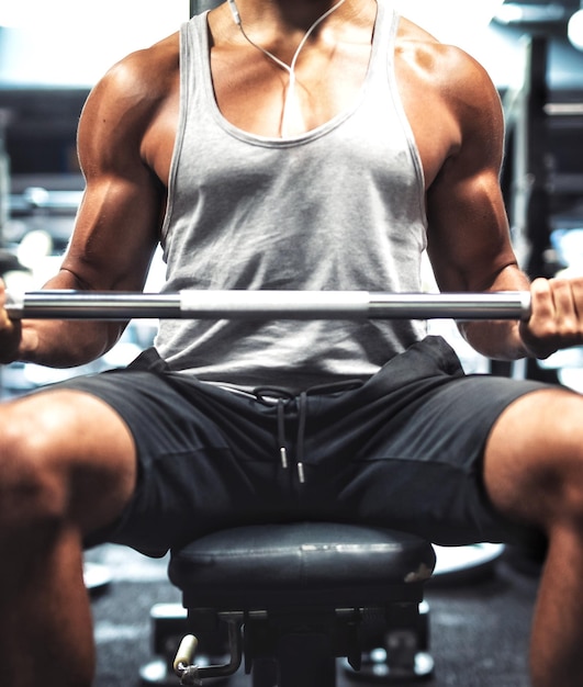 Close-up of man exercising in gym