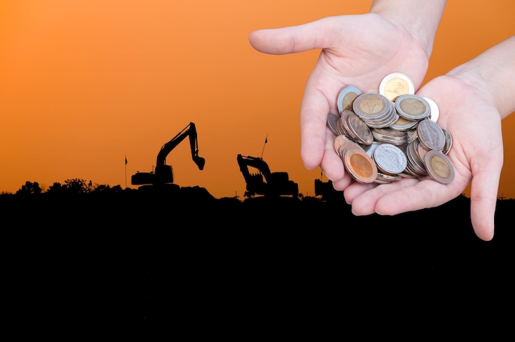 Fotoğraf coins in hands on industry silhouette landscape backgrounddonation investment fund financial support charity dividend market growth home house stock trust wealthy giving planned accounting