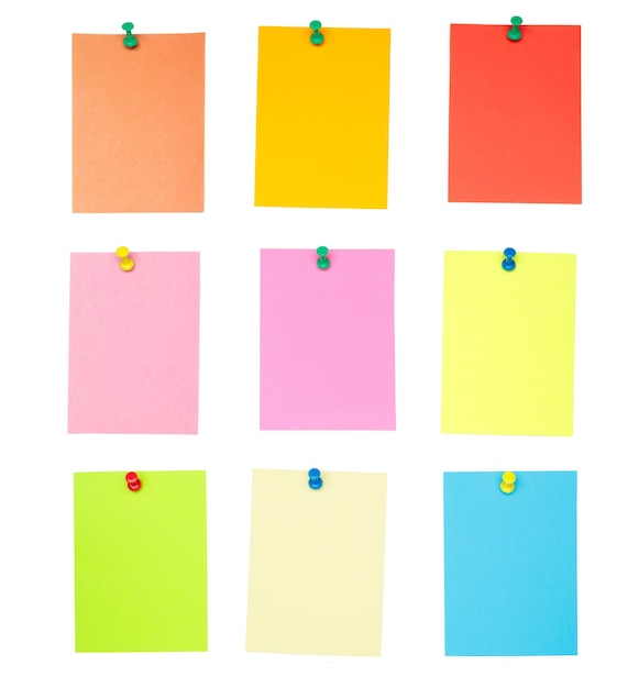 Collection of different colored pinned sheets of note papers stickers Isolated on white background