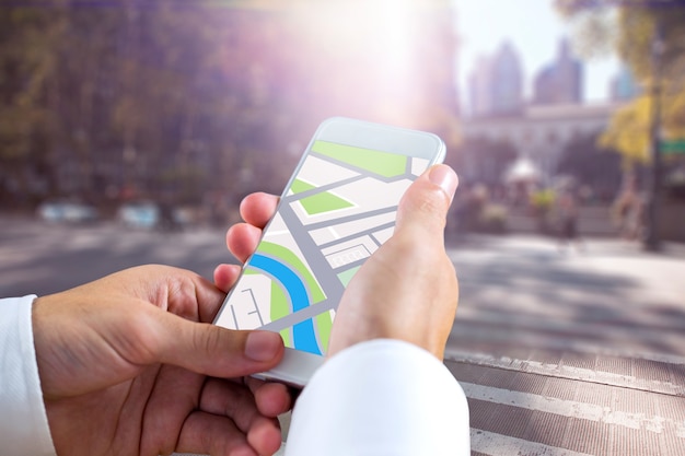 Composite image of man using map app on phone