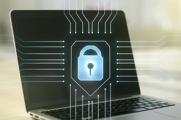Creative lock sketch with chip hologram on modern laptop background protection of personal data concept Multiexposure