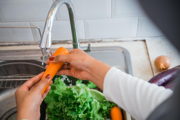 cropped hand of person cleaning equipment