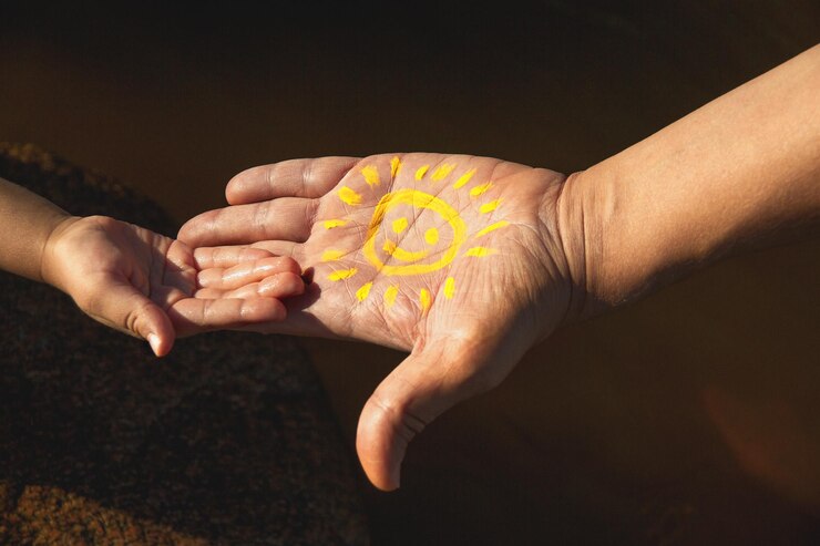 Fotoğraf cropped image of people touching hands