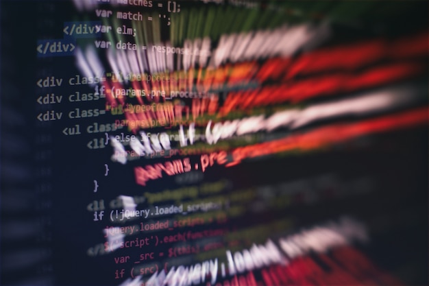 css, javascript and html usage. monitor closeup of function source code. abstract it technology background. software source code.