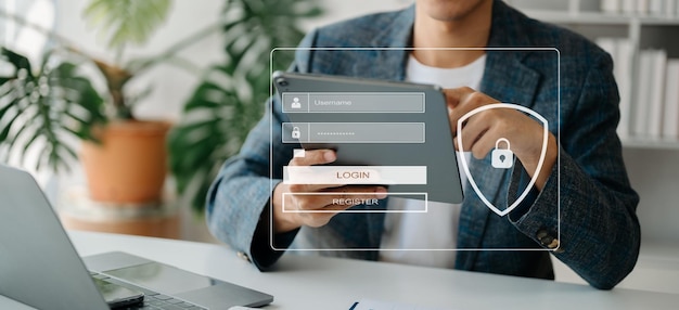 Cyber security concept Login User identification information security and encryption secure access to user's personal information woman using smart phone and tablet in officexA