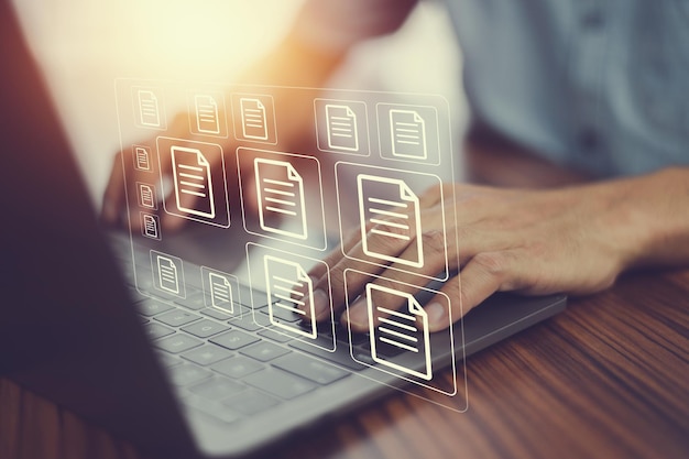 document management concept businessman using computer to document management concept online documentation database and digital file storage system or software records keeping database technology