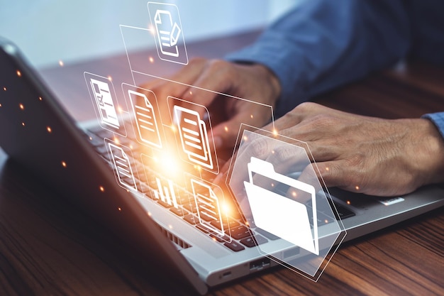 Document management concept Businessman using computer to document management concept online documentation database and digital file storage system or software records keeping database technology