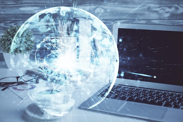 Double exposure of business theme icons and work space with computer background Concept of success