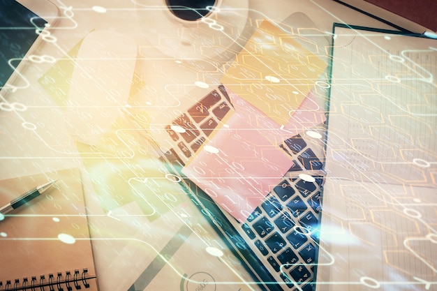 double exposure of data hologram sketch over study table background with computer concept of ai top view