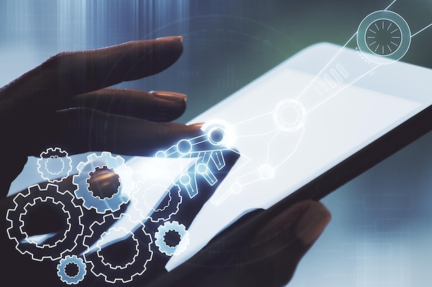 Double exposure of robotics technology hologram and finger clicks on a digital tablet on background Research and development software concept