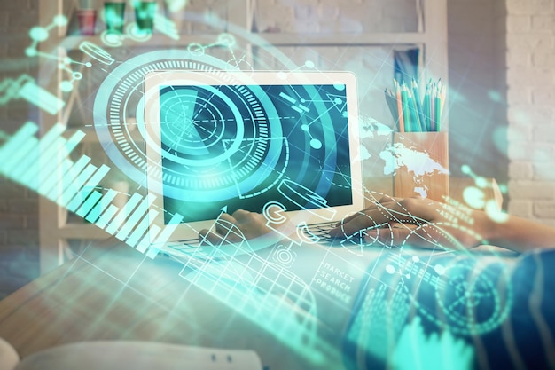 Double exposure of woman hands typing on computer and business theme hologram drawing Success concept
