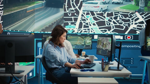Employee navigating on satellite radar and map to search for routes