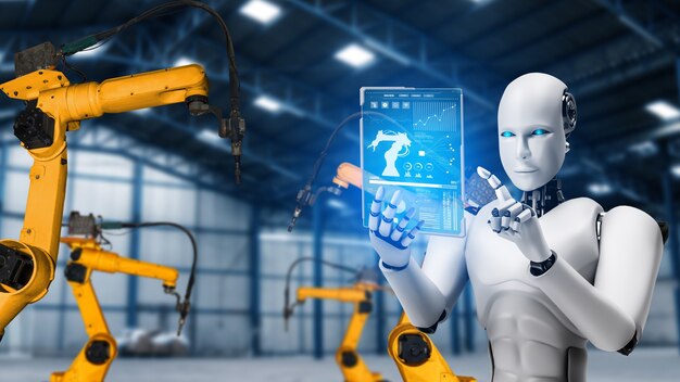 Fabrika üretiminde montaj için kullanılan mekanize endüstriyel robot ve robot kolları.