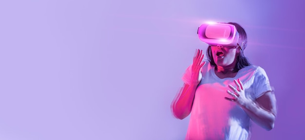 Getting to know digital world Frightened woman in virtual glasses