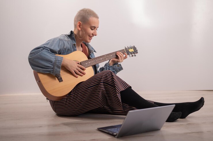 Fotoğraf gitar çalan adam