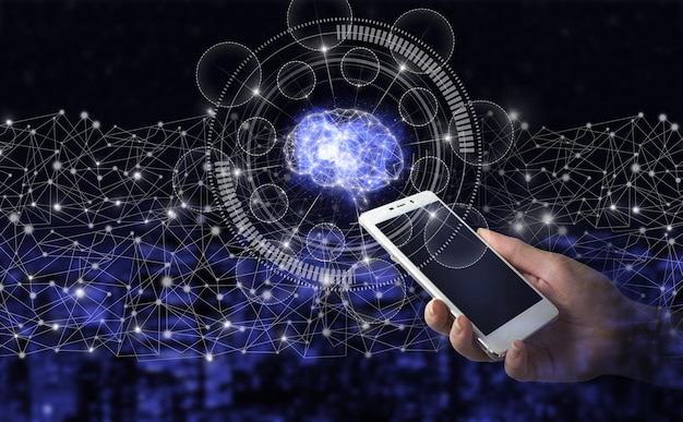 global database and artificial intelligence. hand hold white smartphone with digital hologram brain sign on city dark blurred background. the modern concept of the cyberbrain.