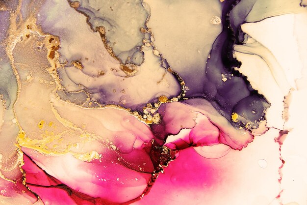 Golden and blue mixed paints Fluid art Liquid marble Alcohol ink