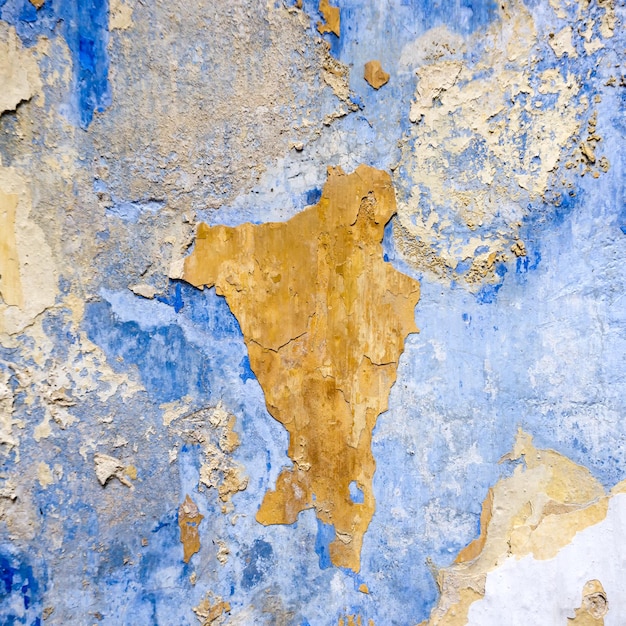 Grunge concrete background with peeling off paint