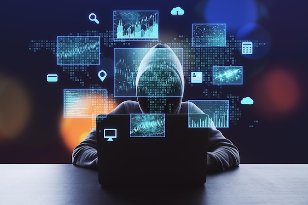 Hacker using laptop with digital finance and data protection interface