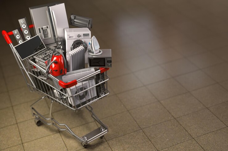 Fotoğraf household appliances in the shopping cart ecommerce or online shopping concept