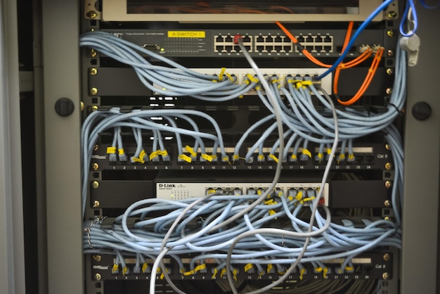klang malaysia october 6th 2024 the image shows a network rack with multiple switches and patch panels connected by numerous ethernet cables