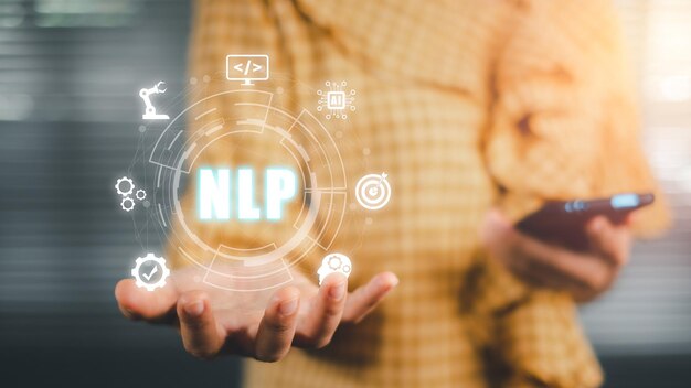 nlp natural language processing cognitive computing technology concept business person hand holding vr screen nlp icon on office desk ai artificial intelligence