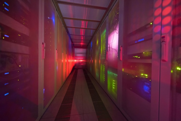 panel modern communication equipment with light from the display at data center in the server room