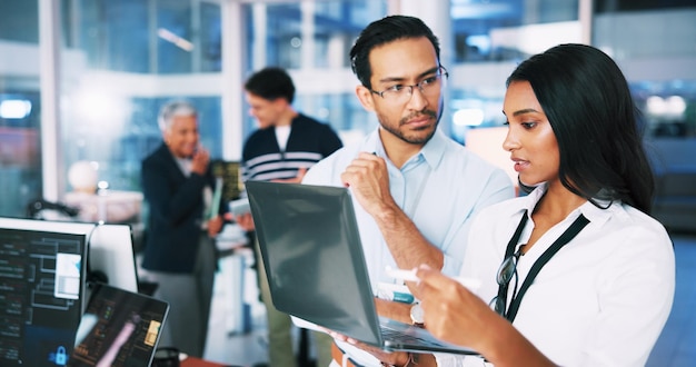 People developer and manager on laptop in office of programming coding training and check server Team mentor and helping with app testing IT intern and web application and troubleshooting system