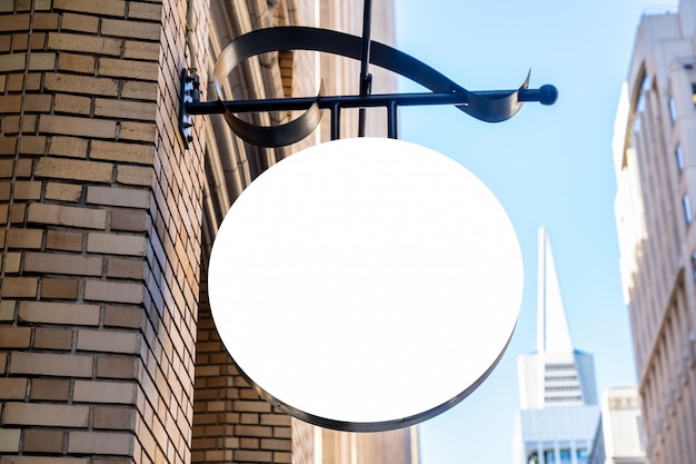 round white company sign concept in a modern city