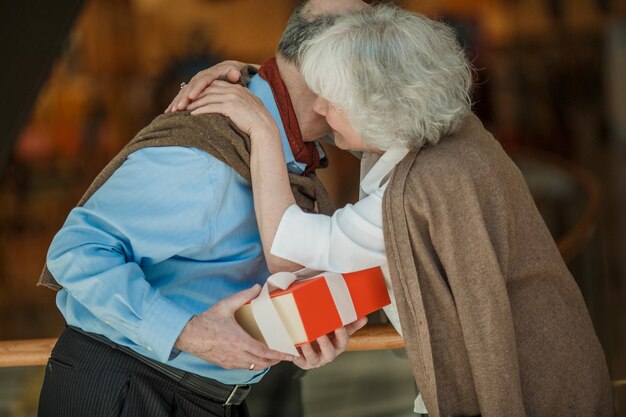 Senior couple in shopping mall