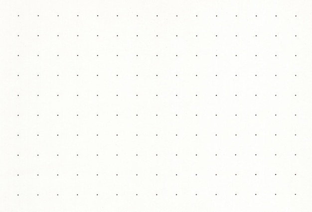 Sheet of blank dotted pale yellow notebook paper background Extra large highly detailed image