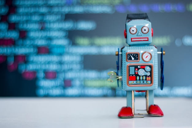 Symbol for a chatbot or social bot and algorithms program code in the background