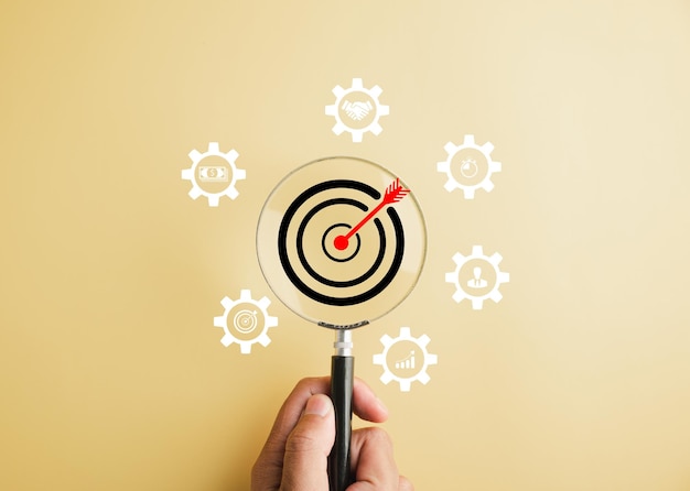 Target icon under magnifying glass