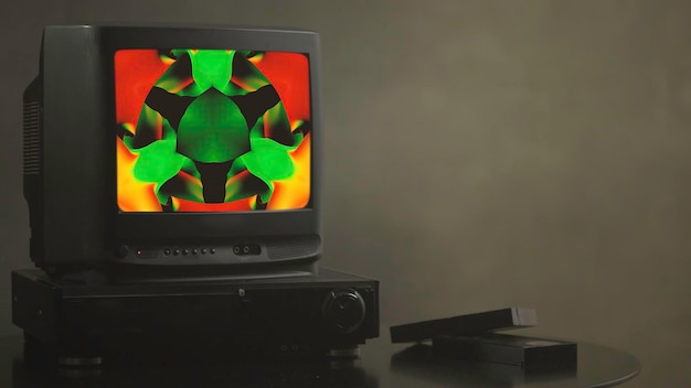 Tv shows abstract pictures tv shows a zombie video on the monitor tv shows video hypnotizing