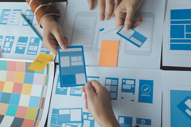 Ux Graphic designer creative sketch planning application process development prototype wireframe for web mobile phone User experience concept