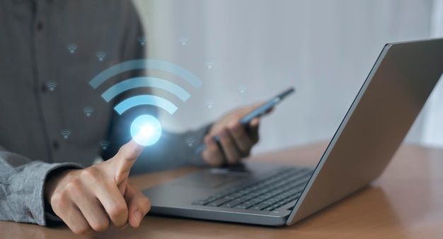 Wifi icon on businessmans hand wireless communication concept business society global