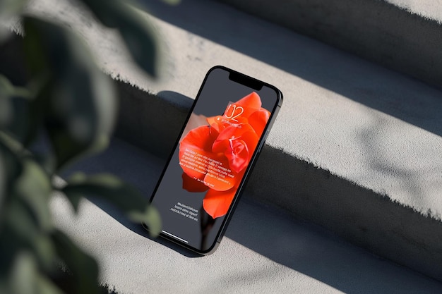 a cell phone sitting on a set of stairs