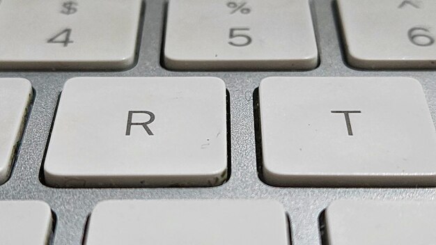 a close up of a keyboard with the word art on it