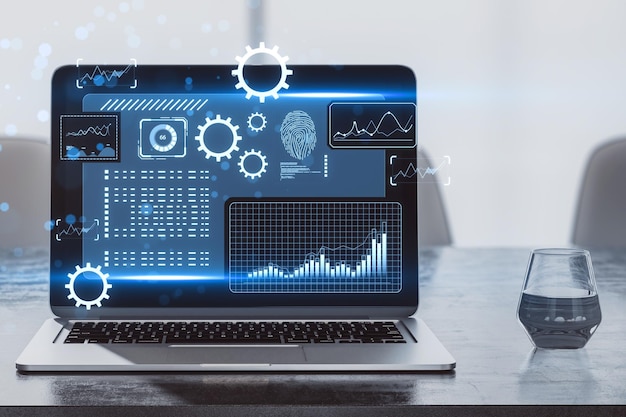 A laptop displaying futuristic interface graphics on an office desk with a glass of water blue and light background concept of technology 3D Rendering