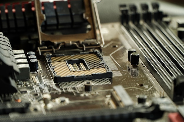 Abstract of electronic engineer of computer technologycomputer technician upgrading computer hardware motherboard cpu by placing CPU on computer motherboard socket
