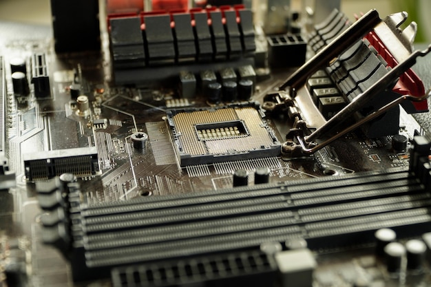 Abstract of electronic engineer of computer technologycomputer technician upgrading computer hardware motherboard cpu by placing CPU on computer motherboard socket