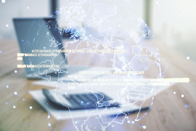 Abstract virtual coding concept and world map hologram on calculator and laptop background Multiexposure