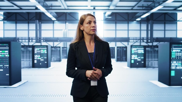 Admin walking in data center monitoring systems