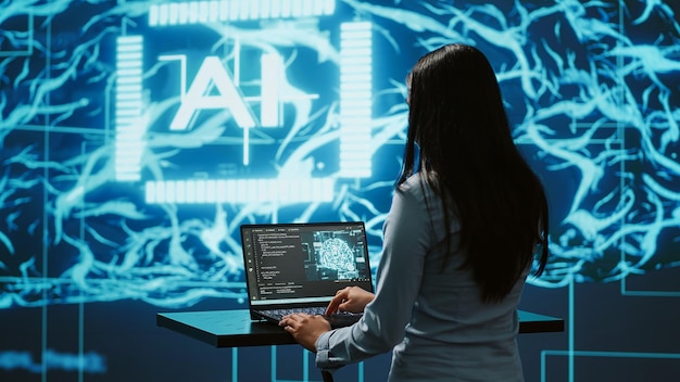 AI specialist reviews data charts working in tech industry