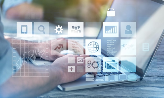 Analyst working with Business Analytics and Data Management System on computer laptop