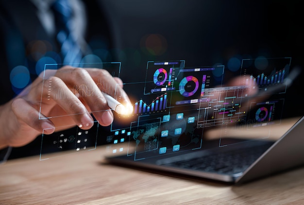 Analyst working with computer in Business Analytics and Data Management System to make report with KPI and metrics connected to database