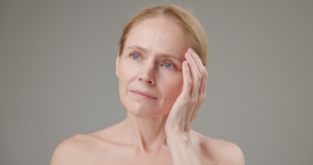 Anti age beauty health and dry skin care concept beautiful middleaged mature caucasian woman in her