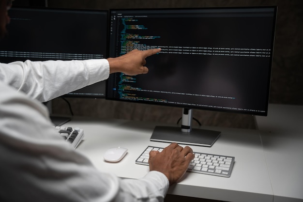 Asian IT Programmer Working on Desktop Computer Male Specialist Creating Innovative Software Engineer Developing App Program